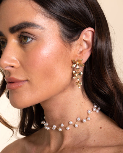 PENDIENTES DANGLE BLOOM · BAÑO ORO